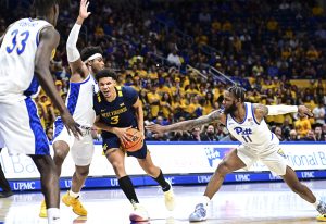Bob Huggins moves past Jim Calhoun on all-time wins list, as West Virginia powers past Portland State